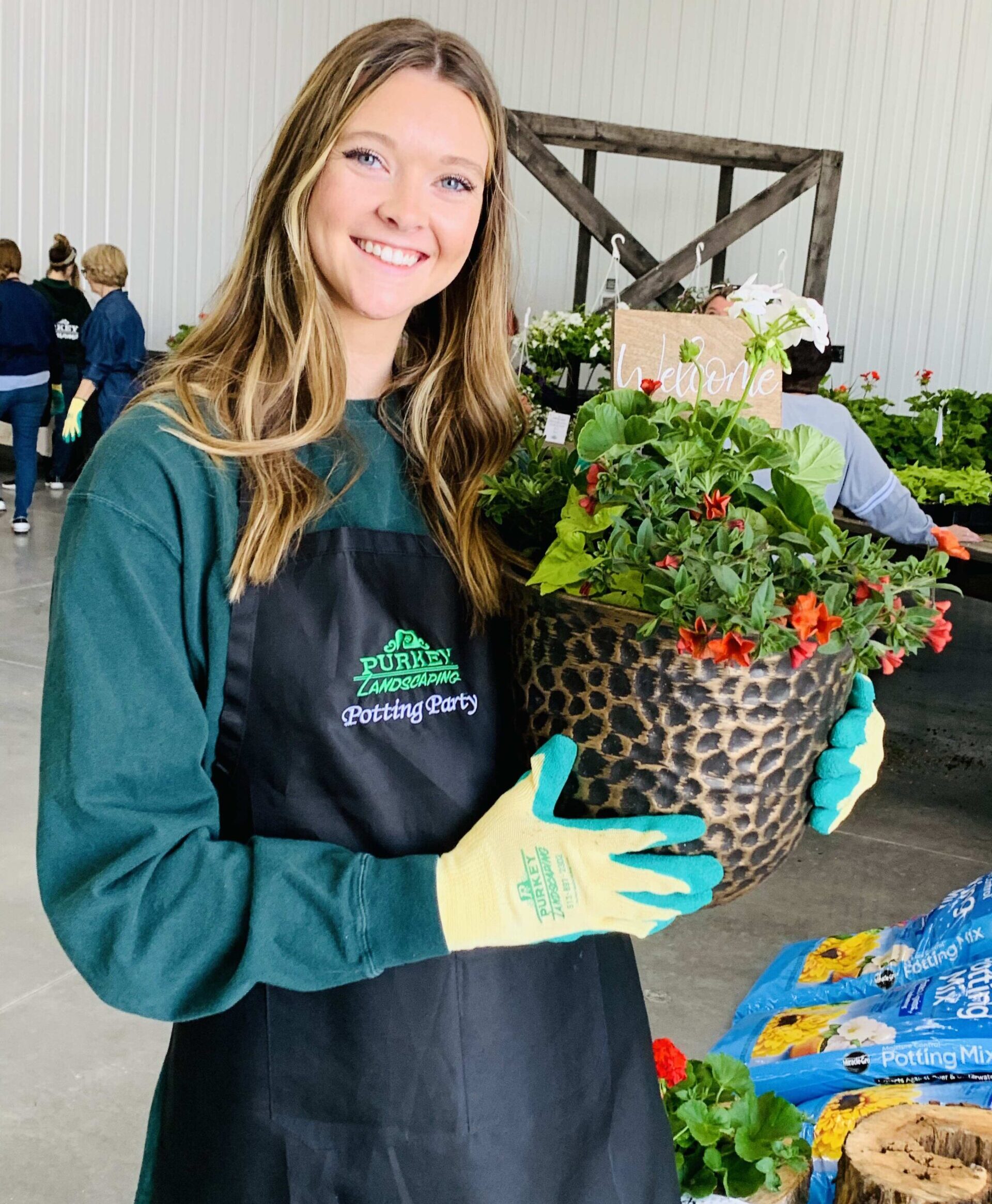Purkey Landscaping Potting Party Madison showcasing a completed pot full of flowers from the potting party